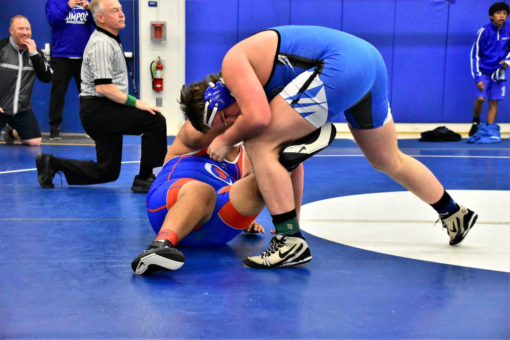 San Marcos' Emmanuel Munoz (Bottom) rolls to escape from Lompoc's Corben Hayes